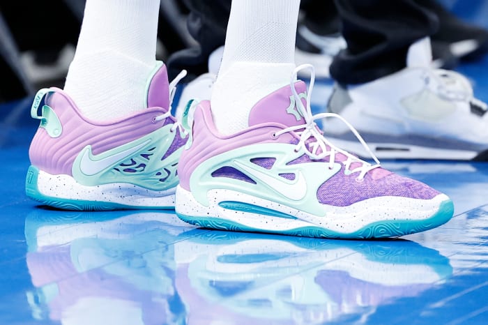 View of Kevin Durant's purple and white Nike shoes.